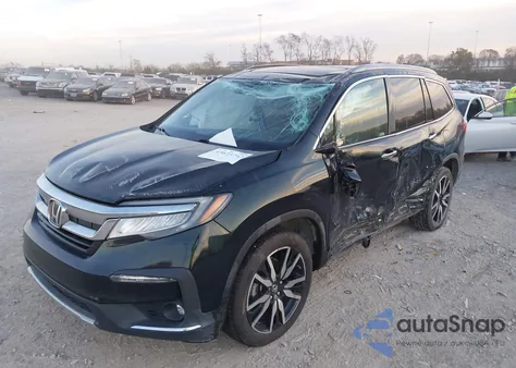 2019 Honda Pilot Elite z USA, uszkodzony, nr VIN 5FNYF6H03KB071156
